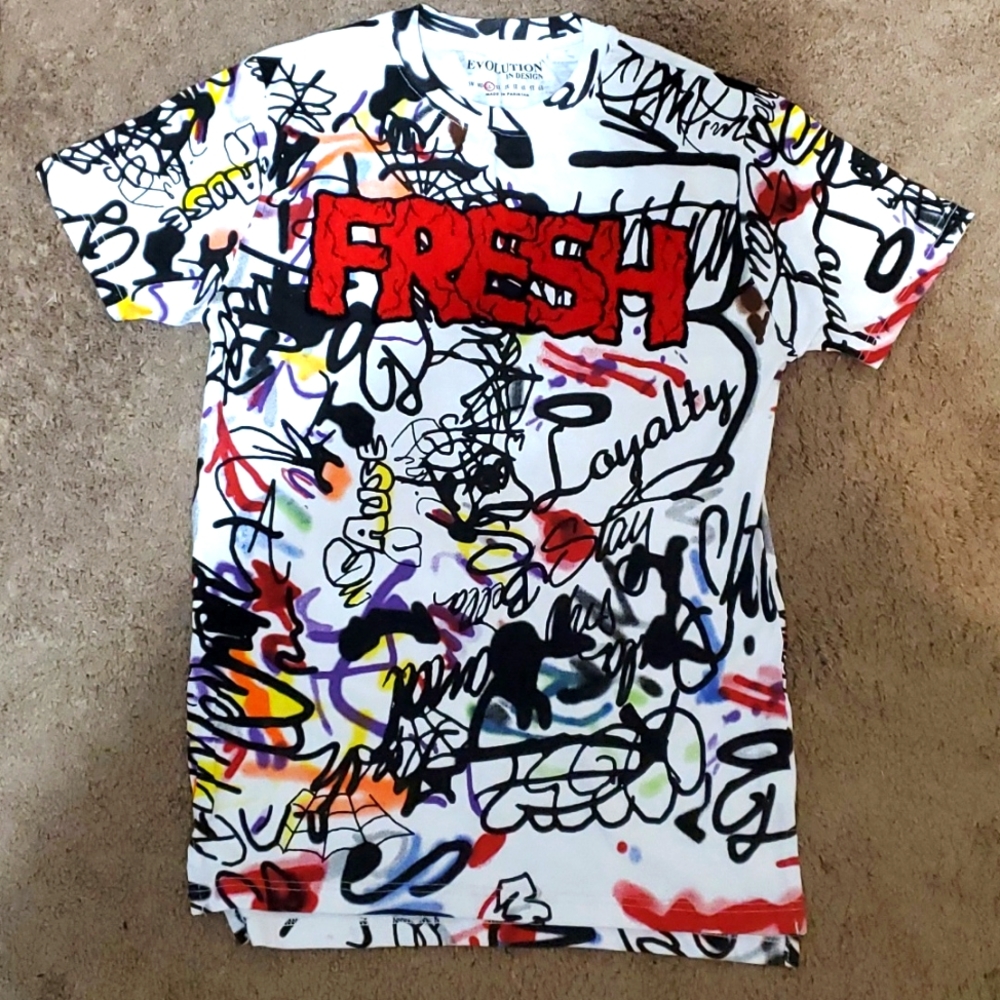 EVOLUTION IN DESIGN MEN GRAPHIC SHIRT SIZE LRG. NWOT.
